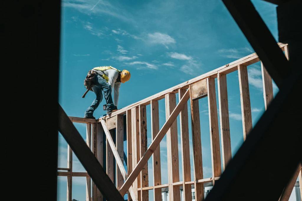 Man standing on wood working